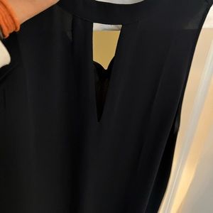 Loft blouse. Sleeveless.  Navy with cutout. Size medium